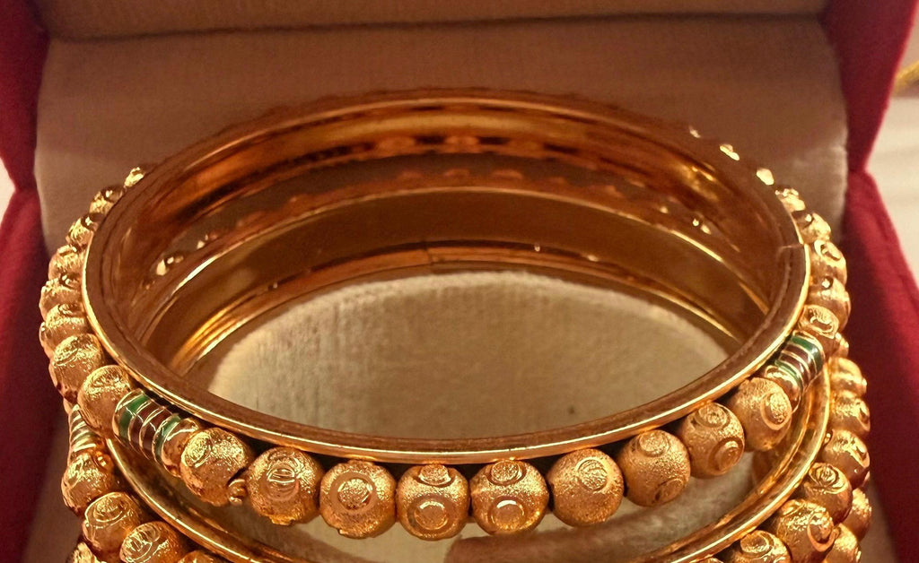 Gold-tone enamel bangle set size 2.8 – textured bangle detail
