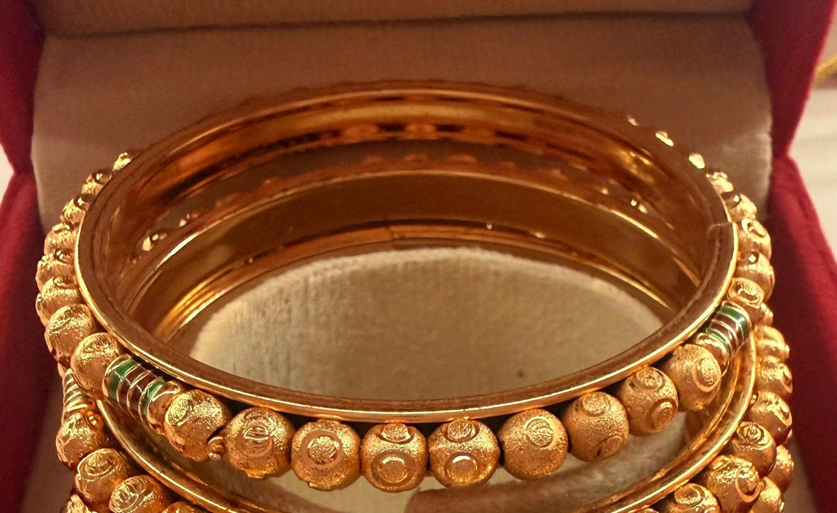 Gold-tone enamel bangle set size 2.8 – textured bangle detail