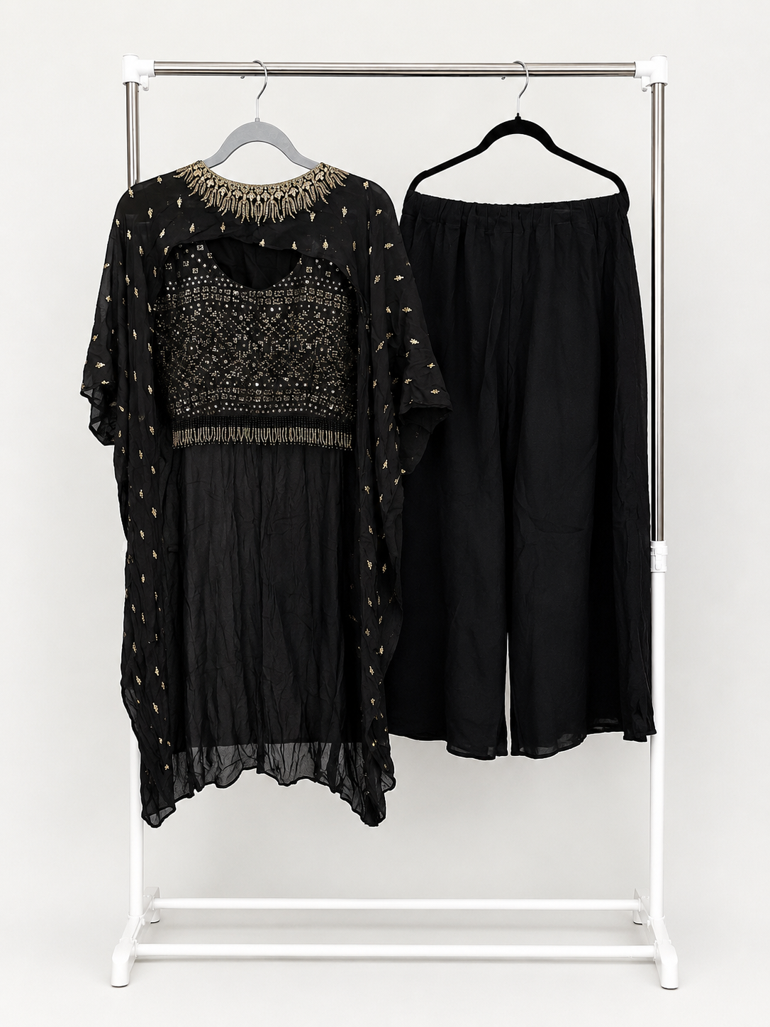 Black and gold embellished crop top and palazzo detail