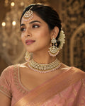 Pink Kundan bridal necklace set with earrings and maang tikka