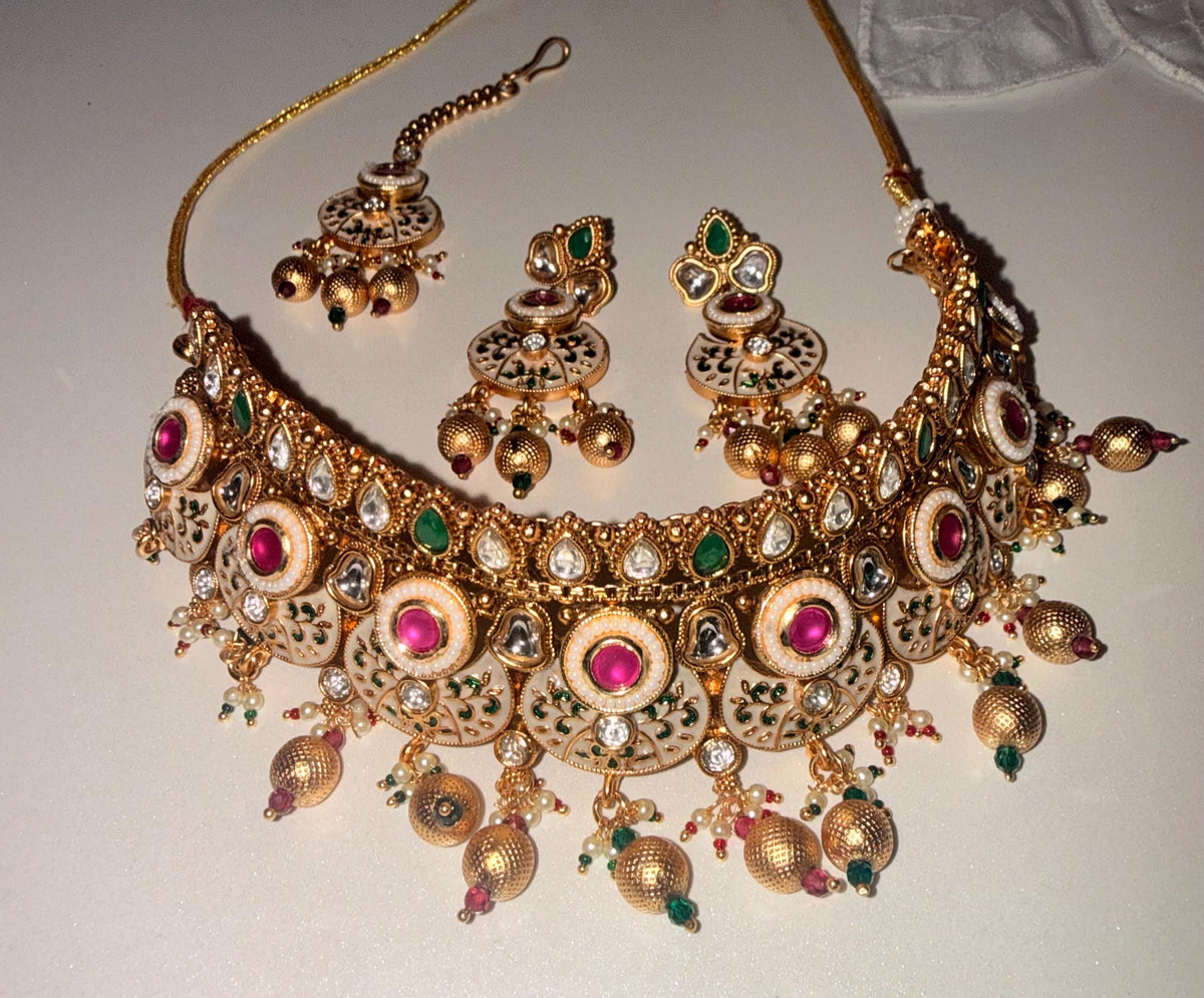 Gold-tone Kundan bridal choker set – pink and green accent detail