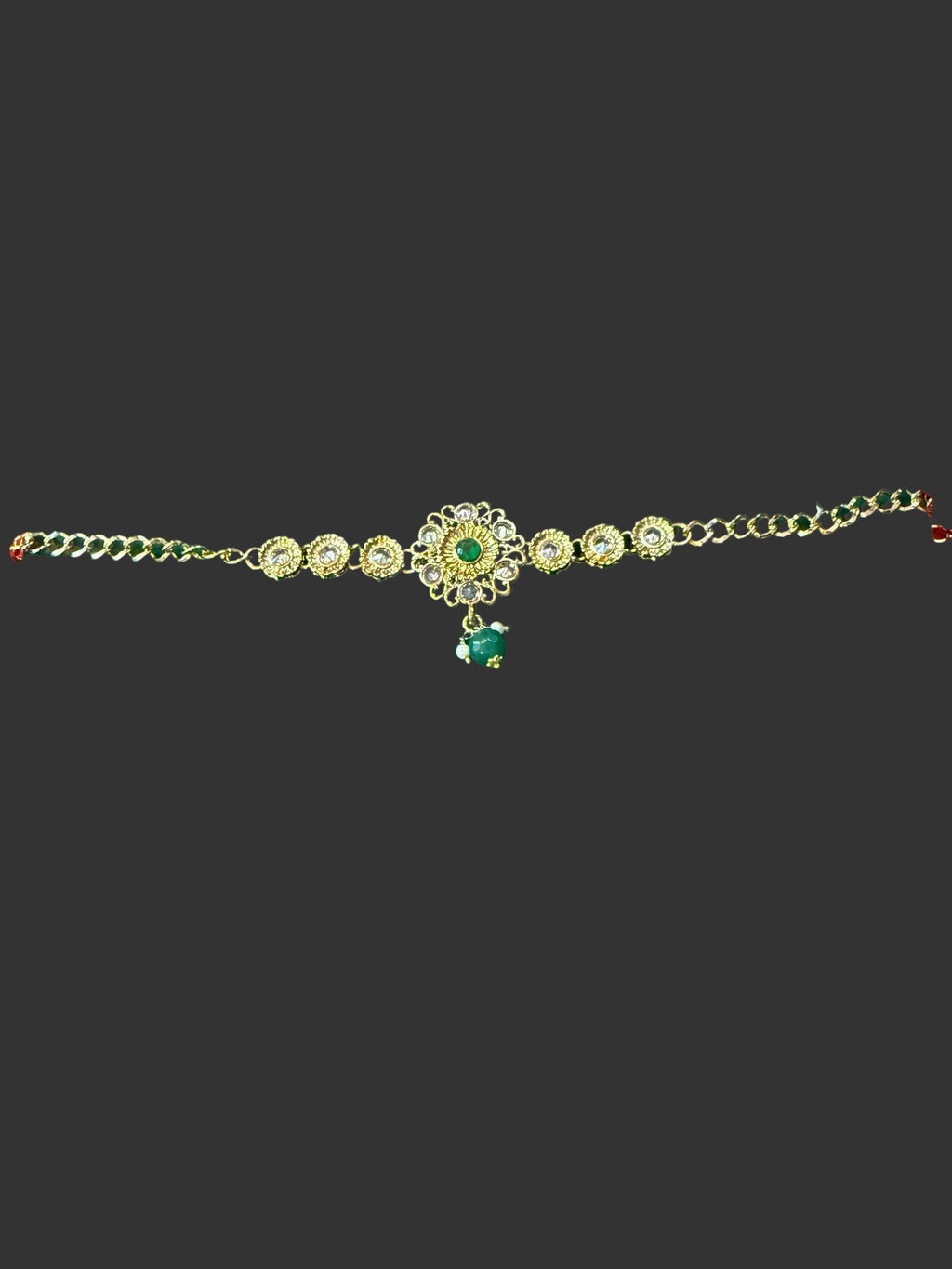 Gold-tone green stone bracelet – decorative link and stone detail