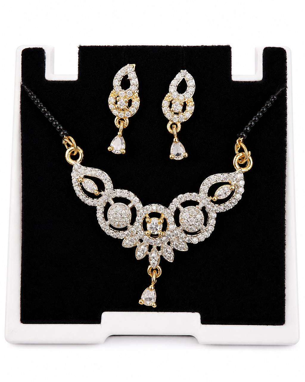 Gold-tone floral mangalsutra pendant and earring detail