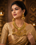 Gold-tone Lakshmi Kundan necklace and jhumka set