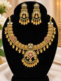 Antique gold temple-style necklace and earrings set