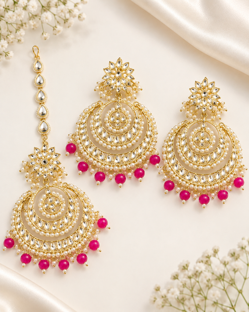 Kundan-style earrings and maang tikka set with pink accents