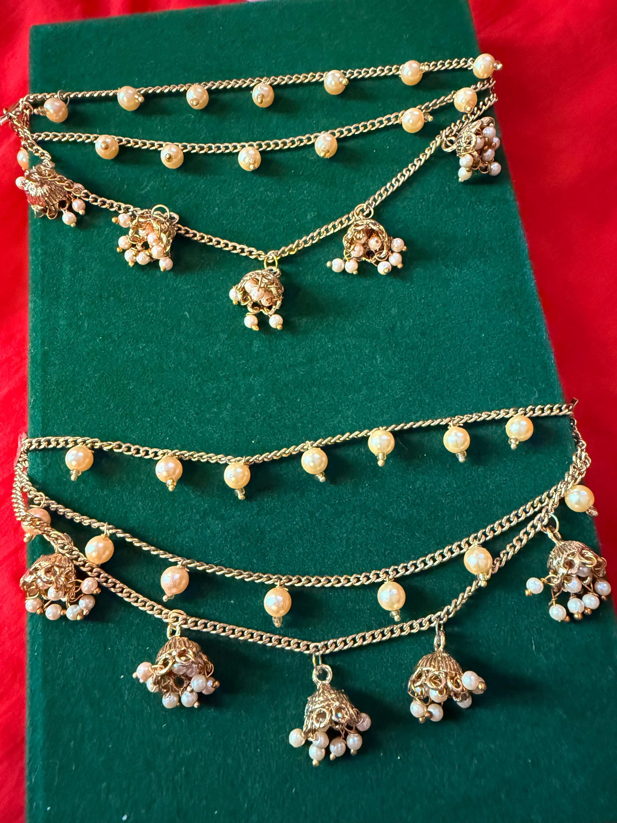 Gold-tone pearl jhumka hair chain extension – layered chain and pearl-style detail