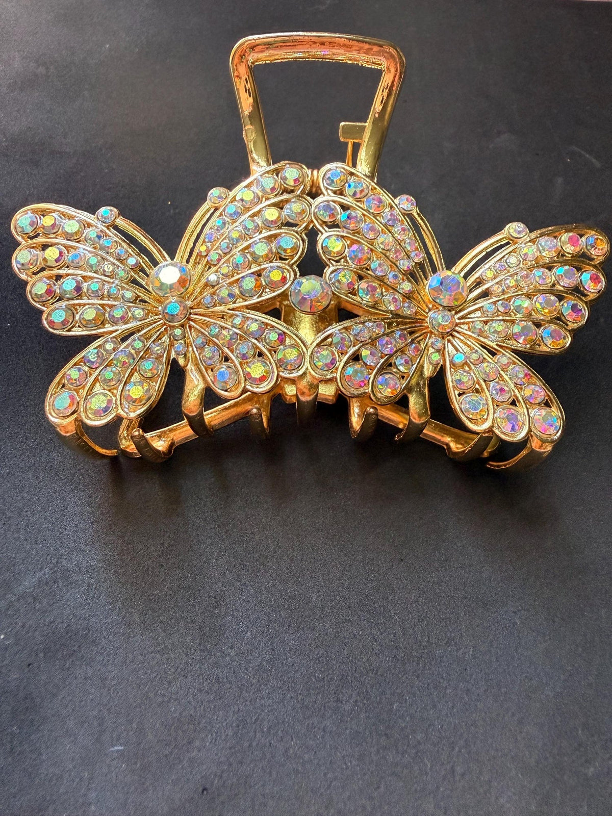 Gold-tone butterfly rhinestone hair claw clip – iridescent crystal detail