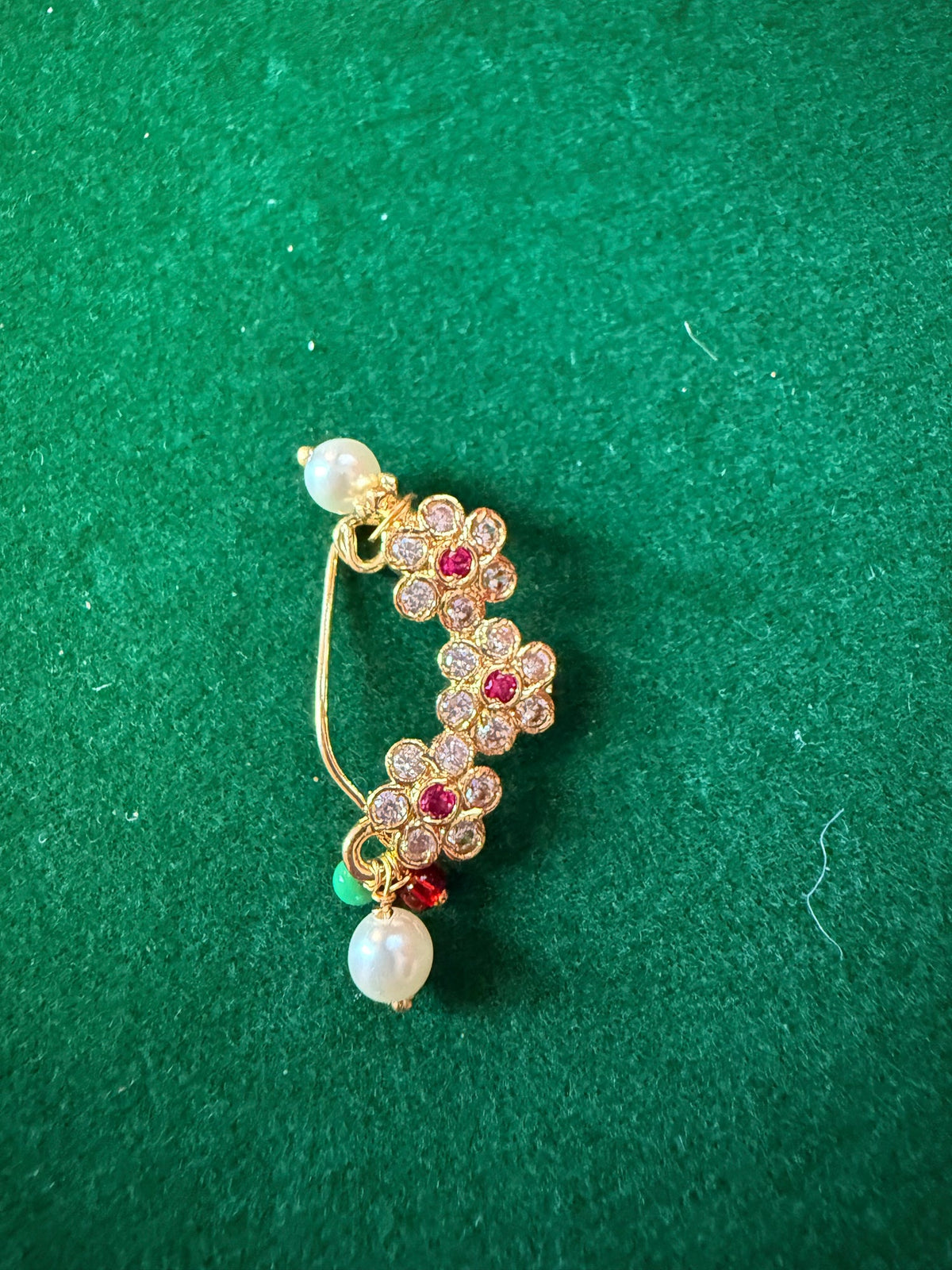 Floral crystal nath nose ring with pearl drops close-up
